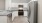 a kitchen with white cabinets