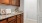 a kitchen with a marble countertop